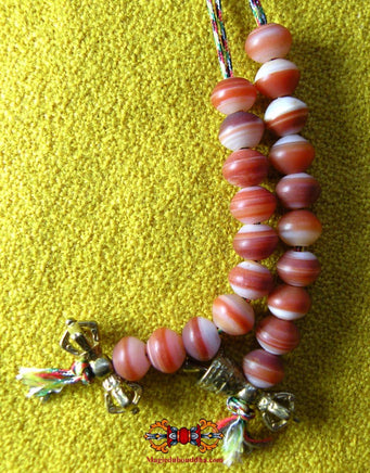 Chapelet tibétain mala en agate dzi. La Magie du Bouddha.