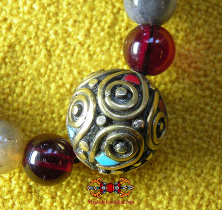 Chapelet tibétain mala en agate dzi. La Magie du Bouddha.