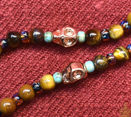 Chapelet Tibétain mala en oeil de tigre. La Magie du Bouddha.