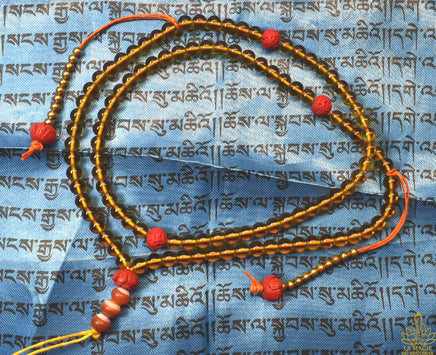 Chapelet tibétain traditionnel en perles de verre jaune – Perles lotus rouges La Magie du Bouddha.