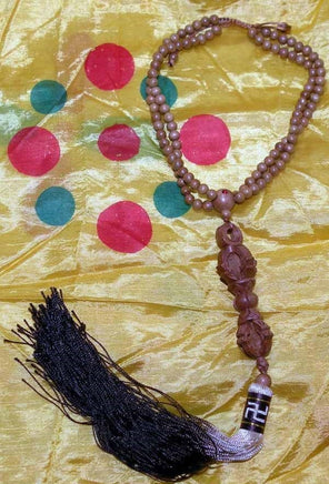 Collier / mala avec dorje en bois - protection pour voiture. magiedubouddha