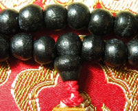 Chapelets Bouddhistes Mala Tibétain en bois - couleurs variées. La Magie du Bouddha.