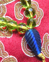 Chapelet Bouddhiste mala en perles de verre à facettes. magiedubouddha