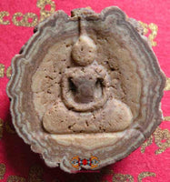 Bouddha sculpté en pierre-relique Phra Siwali magiedubouddha