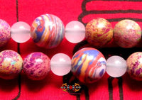Chapelet Bouddhiste Tibétain en pierre rose - Pour la pratique de Tara. La Magie du Bouddha.