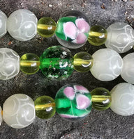 Chapelet Tibétain mala en jade. La Magie du Bouddha.