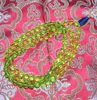 Chapelet Bouddhiste mala en perles de verre à facettes. magiedubouddha