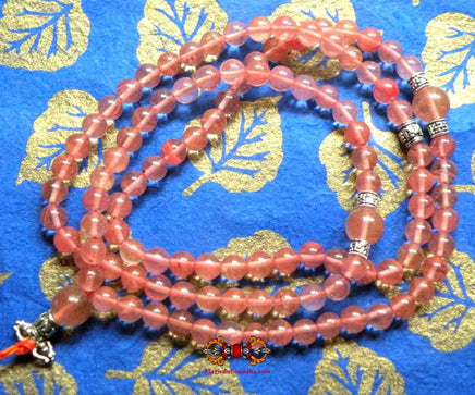 Chapelet Tibétain en quartz rose. La Magie du Bouddha.