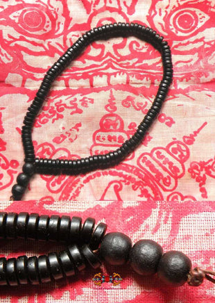 Chapelet votif Look Phrakham Phra Rahu - En coquille de noix de coco sacrée Gala Dta Diao. La Magie du Bouddha.