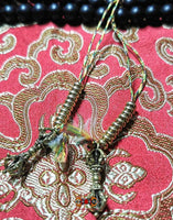 Chapelet Tibétain en perles de Shaligram. La Magie du Bouddha.