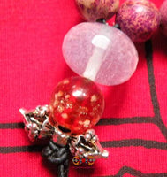 Chapelet Bouddhiste Tibétain en pierre rose - Pour la pratique de Tara. La Magie du Bouddha.