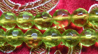 Chapelet Bouddhiste mala en perles de verre à facettes. magiedubouddha