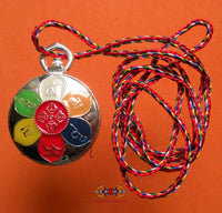 Amulette Dzogchen pilules sacrées de l'esprit (Mind Pills) - Très Vénérable Chogyal Namkhai Norbu Rinpoché. La Magie du Bouddha.