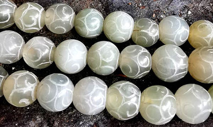 Chapelet Tibétain mala en jade. La Magie du Bouddha.