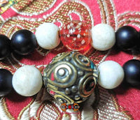 Chapelet Tibétain en perles de Shaligram. La Magie du Bouddha.