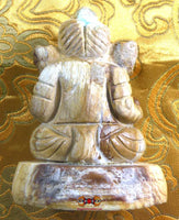 Statuette de Ganesh en bois fossile magiedubouddha