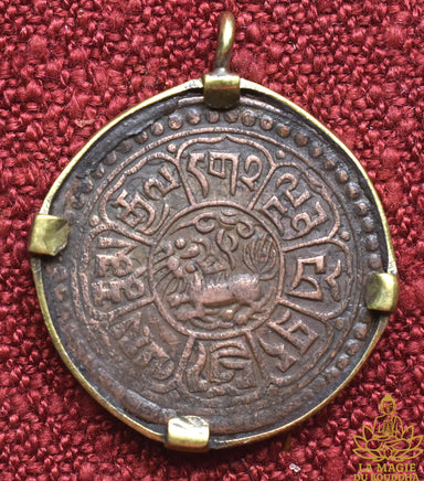 Pièce tibétaine ancienne 1 Sho du Tibet libre montée en pendentif La Magie du Bouddha.
