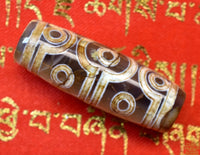 Dzi tibétain à dix yeux en agate translucide – Perle rare de prospérité et d’éveil