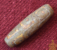 Perle tibétaine sacrée Dzi neuf yeux ancienne patine naturelle La Magie du Bouddha.