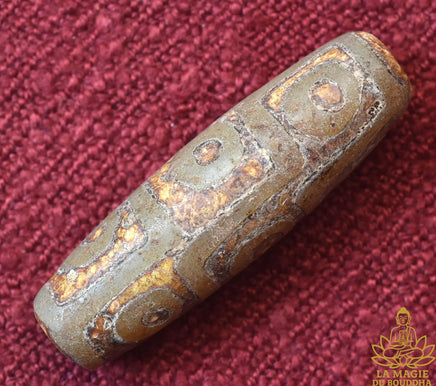 Perle tibétaine sacrée Dzi neuf yeux ancienne patine naturelle La Magie du Bouddha.