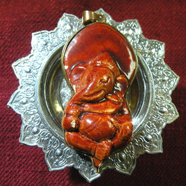 Nepalese Ganesh pendant in red ceramic.