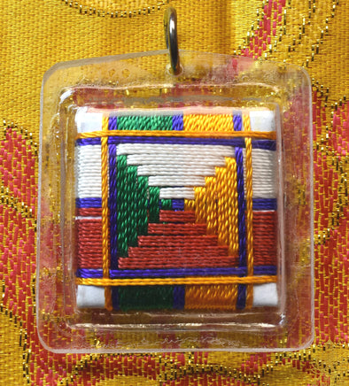 Amulette Tibétaine Yantra Khunthup – Énergie, Vitalité et Réalisation des Objectifs La Magie du Bouddha.