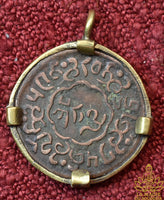 Ancienne monnaie tibétaine de 5 Skar montée en pendentif La Magie du Bouddha.