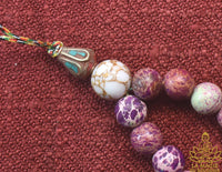 Chapelet mala tibétain en jaspe impérial La Magie du Bouddha.
