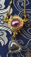 Collier sacré avec bille des Nâgas rose et Phra Pidta en sable du Mékhong (Wat Pochai – Udon Thani) La Magie du Bouddha.