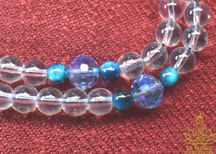 📿 Mala tibétain artisanal en cristal et oeil de faucon La Magie du Bouddha.
