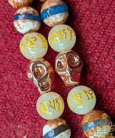 Handmade Tibetan mala for the Medicine Buddha Sangye Menla mantra in blue banded agate and Ye Ming Zhu stone