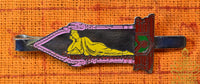 Vintage stainless steel tie clip with polychrome reclining Buddha