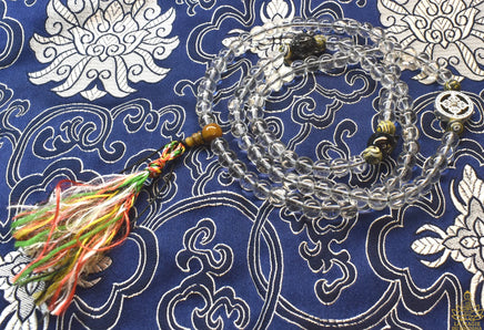 Chapelet Mala Tibétain en Cristal Spatika – Ornements Tigre et Dorje La Magie du Bouddha.