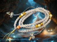 Chapelet Mala Tibétain en Cristal Gravé – Mantra de Chenrézi et Perles Fluorescentes Ye Ming Zhu. La Magie du Bouddha.