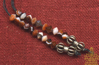 Mala Précieux en Agate Dzi du Tibet La Magie du Bouddha.