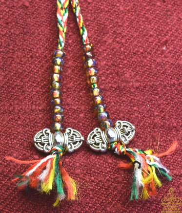 Chapelet Tibétain Mala – Perles mantra de Chenrezi en verre jaune La Magie du Bouddha.