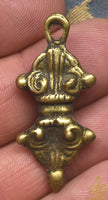 Pendentif artisanal tibétain Dorje en bronze ancien La Magie du Bouddha.