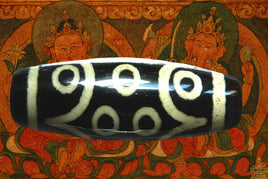 Small Tibetan Dzi with 15 eyes. 
