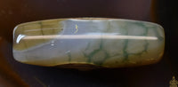 Perle sacrée tibétaine Dzi en agate – Motif spirale (évolution et énergie vitale) La Magie du Bouddha.