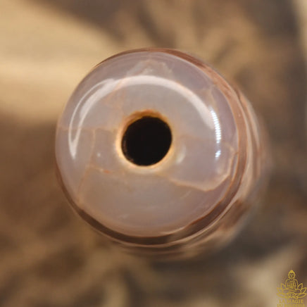 Perle sacrée tibétaine Dzi translucide à sept yeux La Magie du Bouddha.