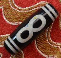 Perle sacrée tibétaine Dzi ancienne – Symbole de l’infini
