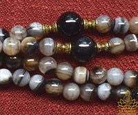 Mala Précieux en Agate Dzi du Tibet La Magie du Bouddha.
