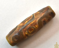 Perle sacrée tibétaine Dzi à neuf yeux – Talisman de prospérité et de pouvoir spirituel