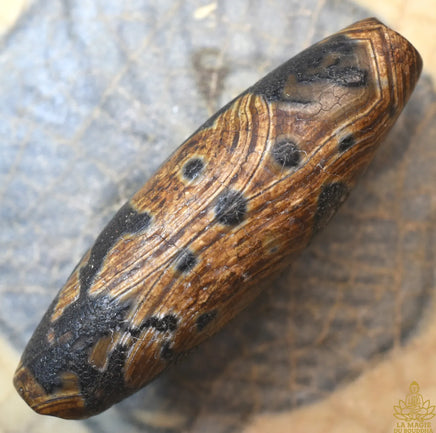 Perle Dzi ancienne – Nœud d’Éternité – Artisanat traditionnel tibétain La Magie du Bouddha.