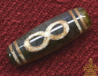 Perle sacrée tibétaine Dzi artisanale au symbole de l’infini La Magie du Bouddha.