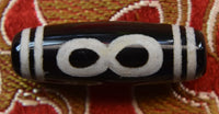 Perle sacrée tibétaine Dzi ancienne – Symbole de l’infini