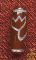 Perle sacrée tibétaine Dzi Lotus en cornaline artisanale récente La Magie du Bouddha.