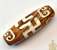 Perle Dzi tibétaine Svastika Tradition Bönpo en agate La Magie du Bouddha.