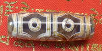 Dzi tibétain à dix yeux en agate translucide – Perle rare de prospérité et d’éveil