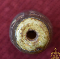 Perle sacrée tibétaine Dzi à neuf yeux en agate ancienne début XXe siècle La Magie du Bouddha.